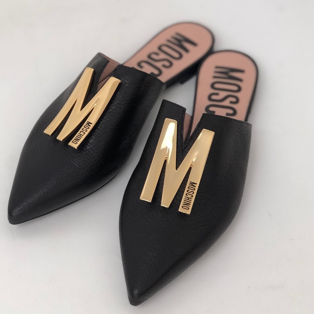 Moschino gold logo plaque black leather pointed toe mules slides